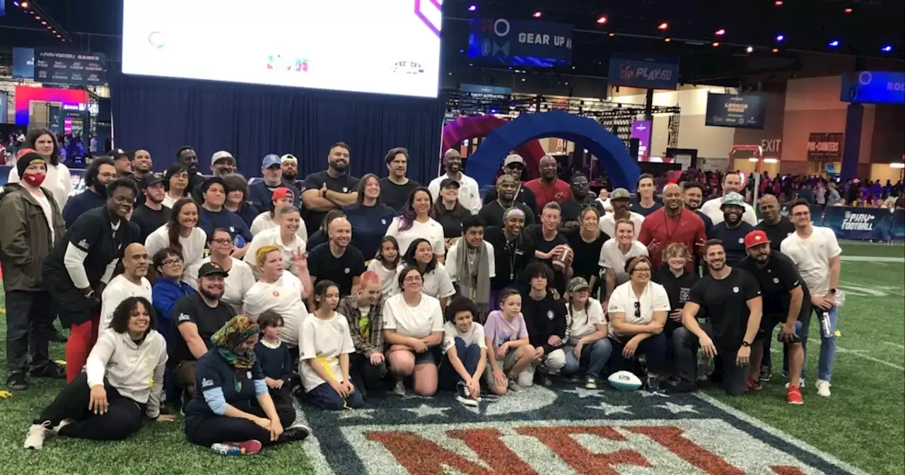 NFL teams up with local LGBTQ organization for youth football clinic during Super Bowl week