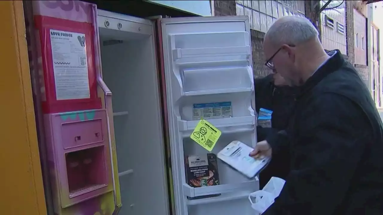 Volunteers pitch in to keep Chicago's Love Fridges fully stocked