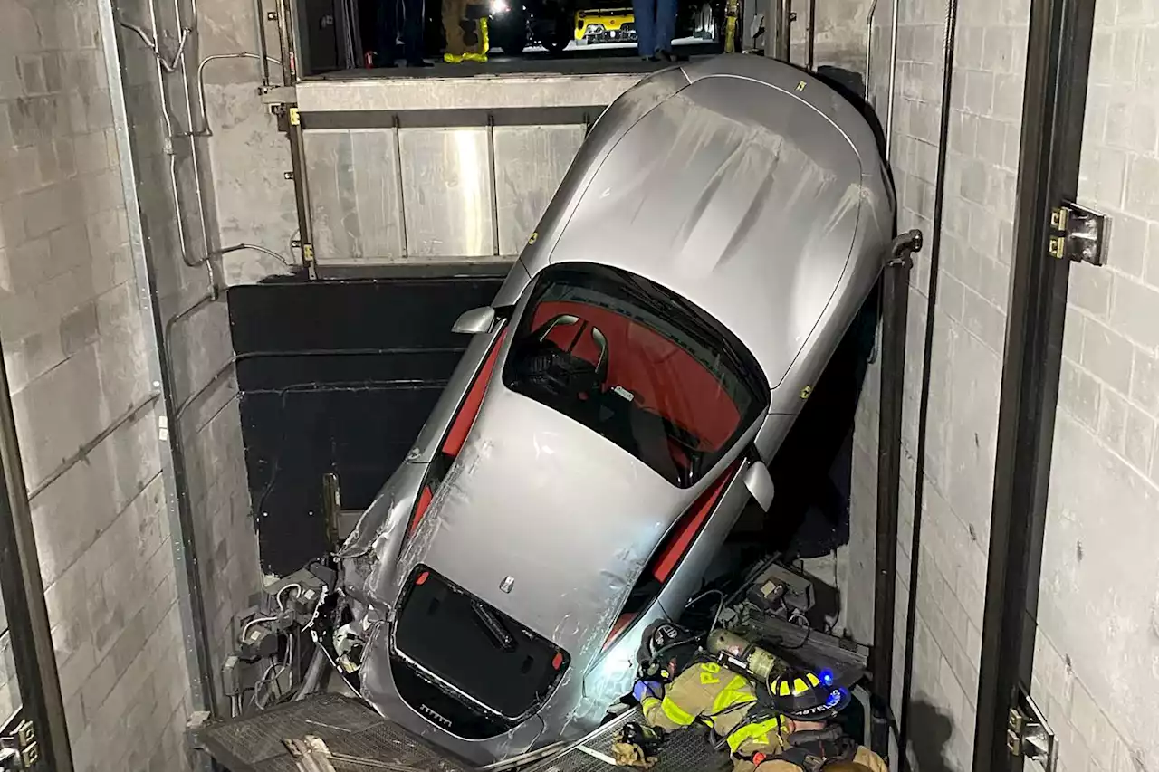 Going Down: Ferrari tumbles down dealership's car elevator