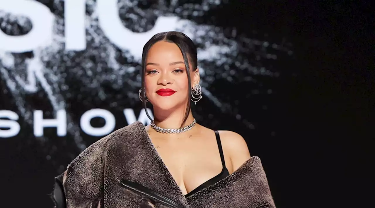 Rihanna Reveals Details About Halftime Show Set List’s ‘39 Versions’ in Snake-Print Dress at Apple Music Super Bowl Press Conference