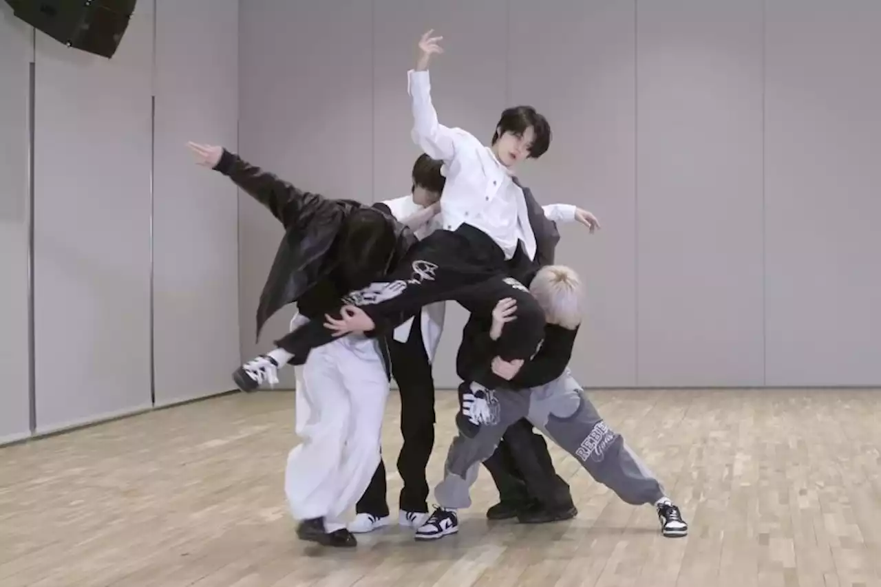 Watch: TXT Wows In Stunning Dance Practice Video For “Devil By The Window”