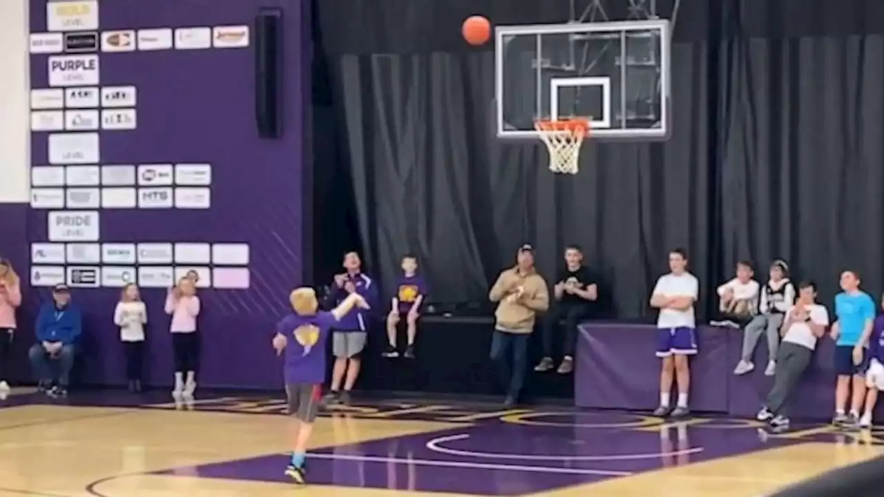 7th grader wins $10K after scoring impressive half-court shot