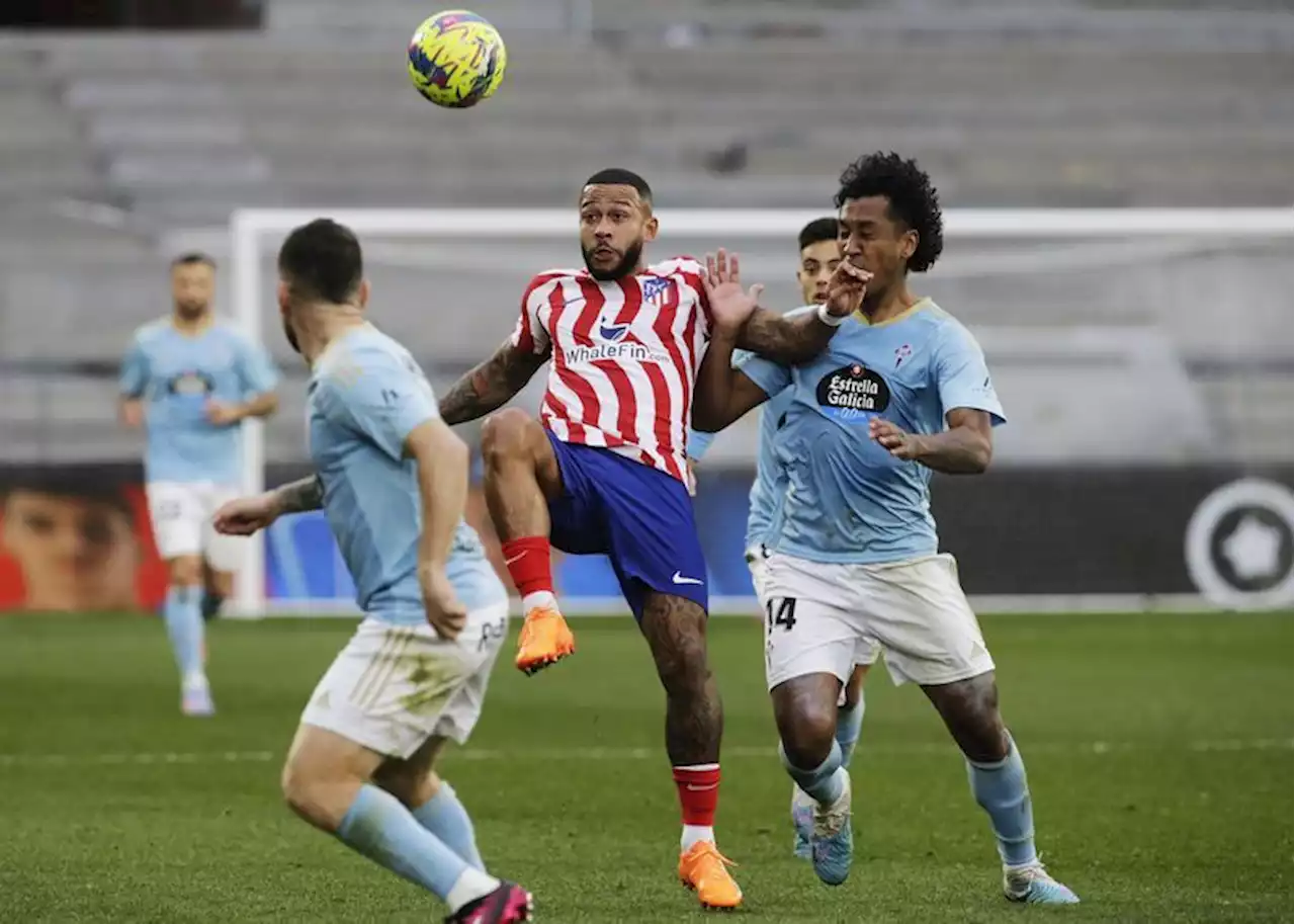 Soccer-Depay fires late winner to give 10-man Atletico victory at Celta Vigo