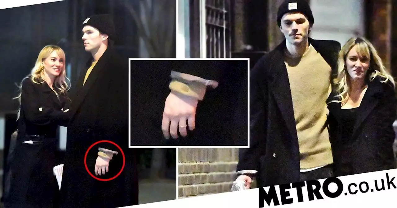 Nicholas Hoult wears ring on wedding finger on date night with longtime partner