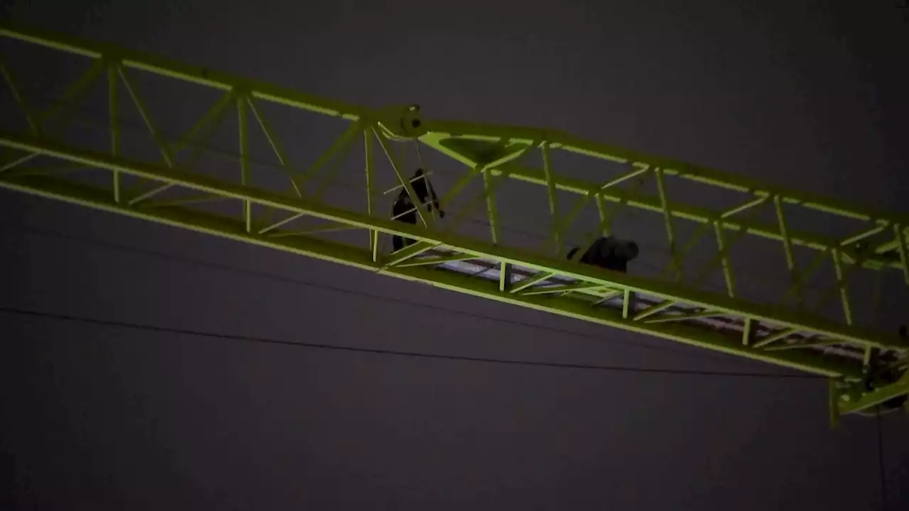 Man in Police Custody After Climbing Dallas Crane