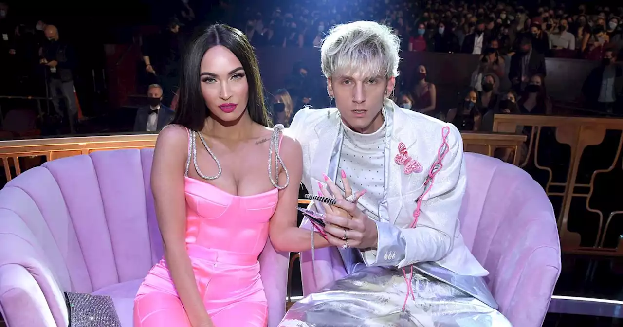 Signs Megan Fox and Machine Gun Kelly had split including Eminem follow