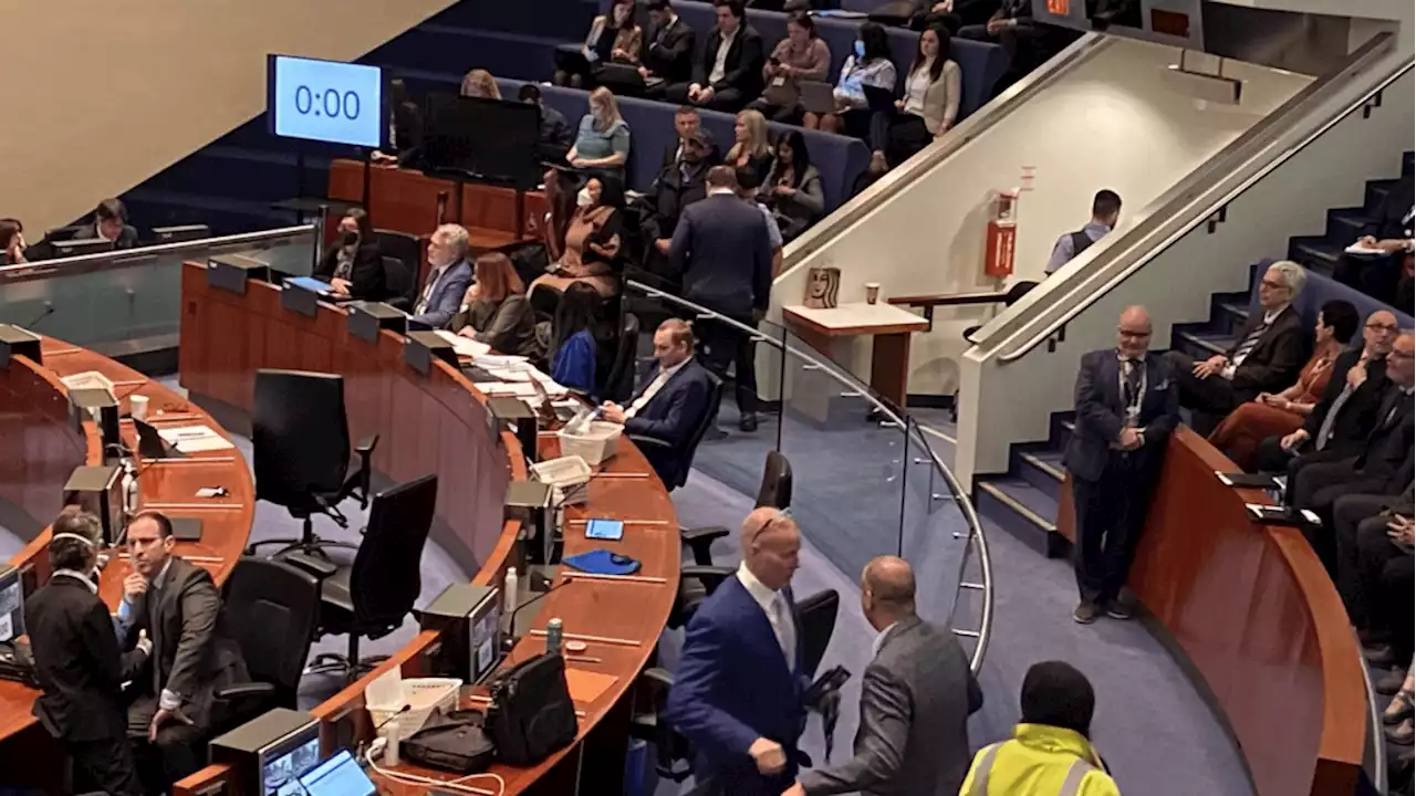 Council chambers cleared twice at Toronto city hall as protesters chant at mayor