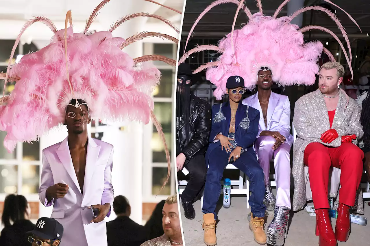 Lil Nas X sports towering feathered headpiece at Christian Cowan NYFW show