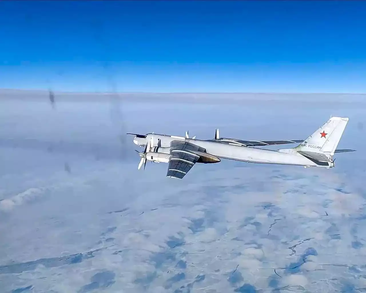 Russian bomber intercepted near Alaska as search continues for downed ‘objects’