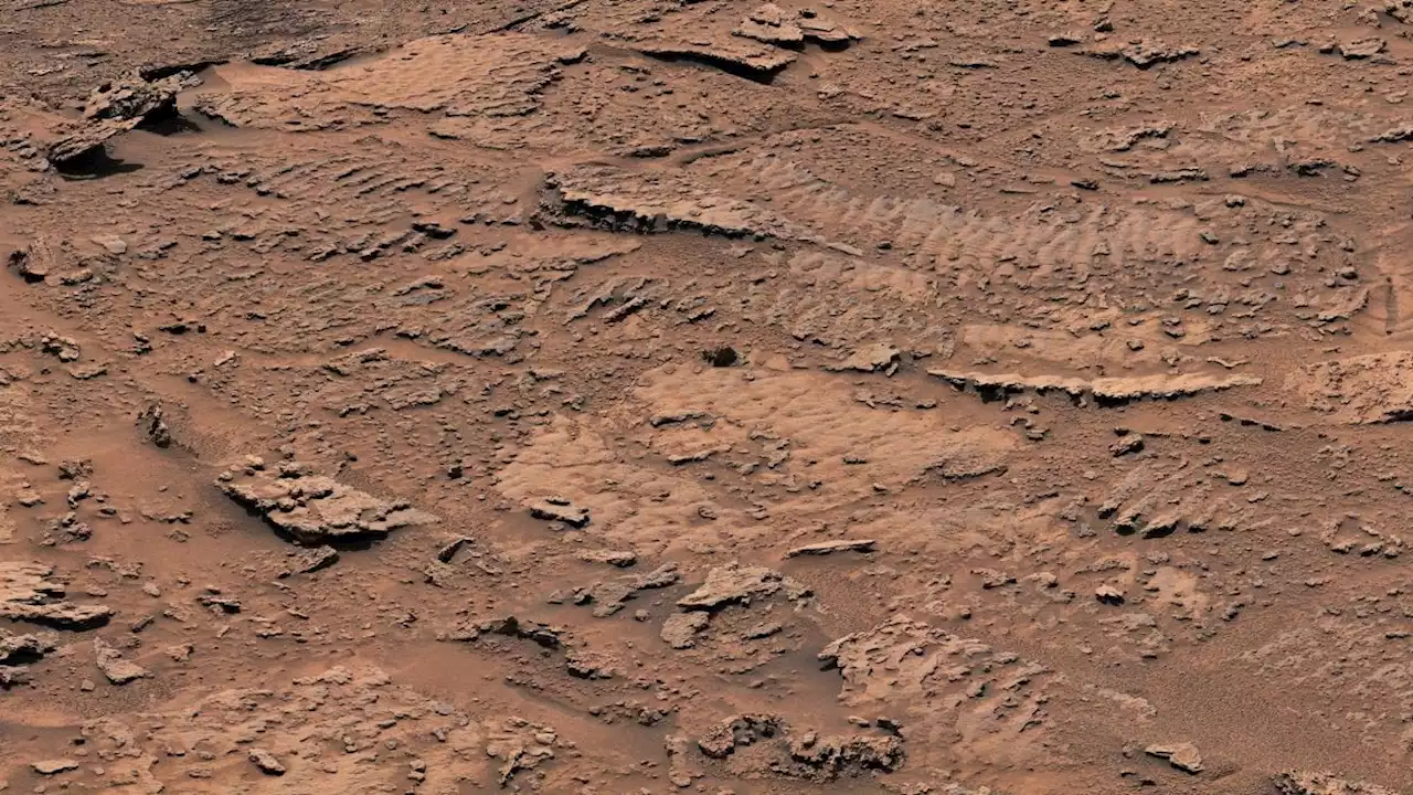 NASA rover snaps photos of ancient 'waves' carved into Mars mountainside