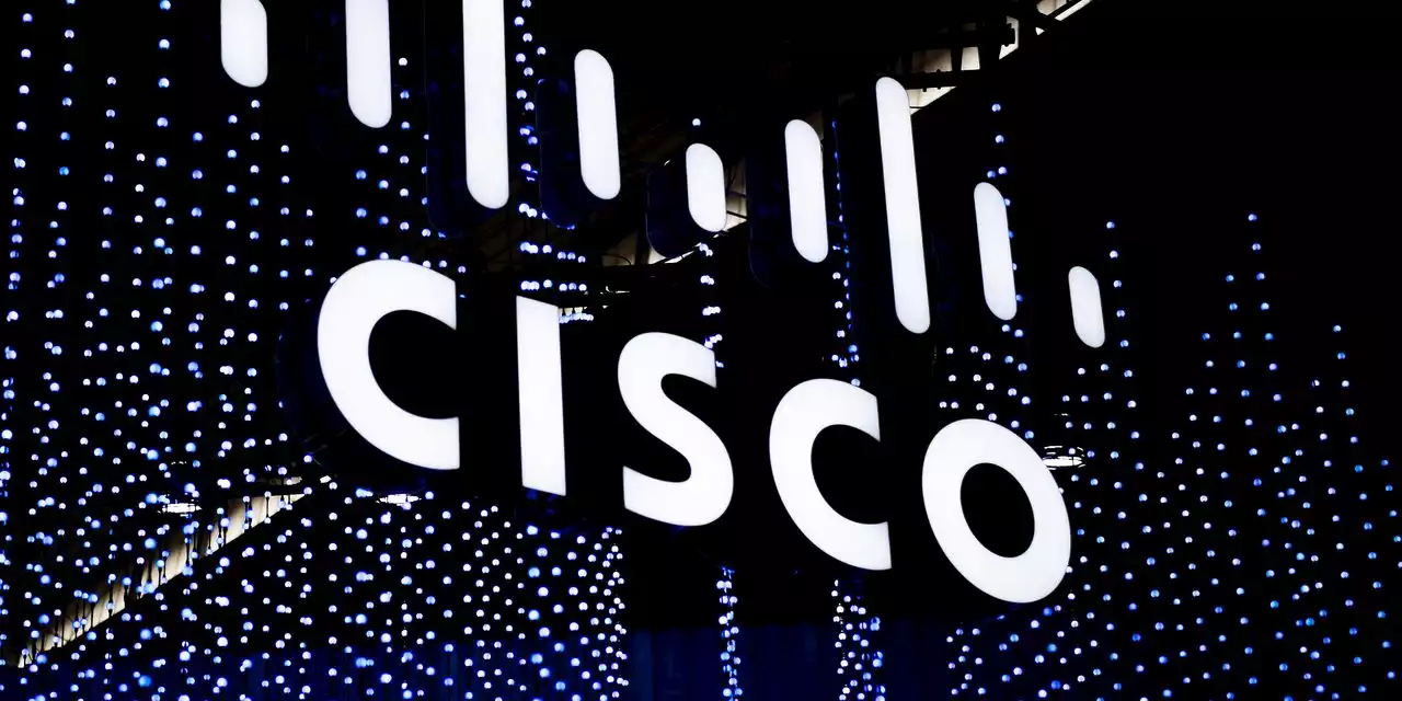 Cisco stock spikes after earnings and revenue beat, annual forecast raised