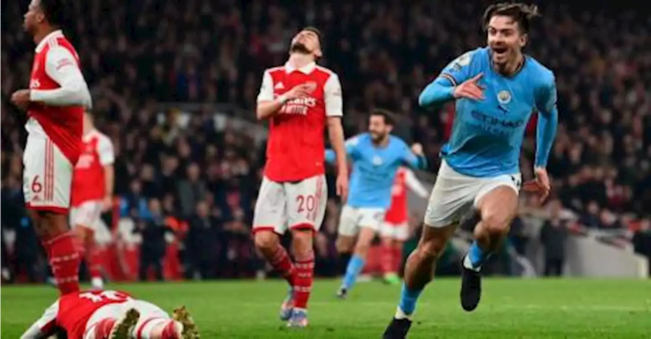 Man City sink Arsenal to seize top spot in title race