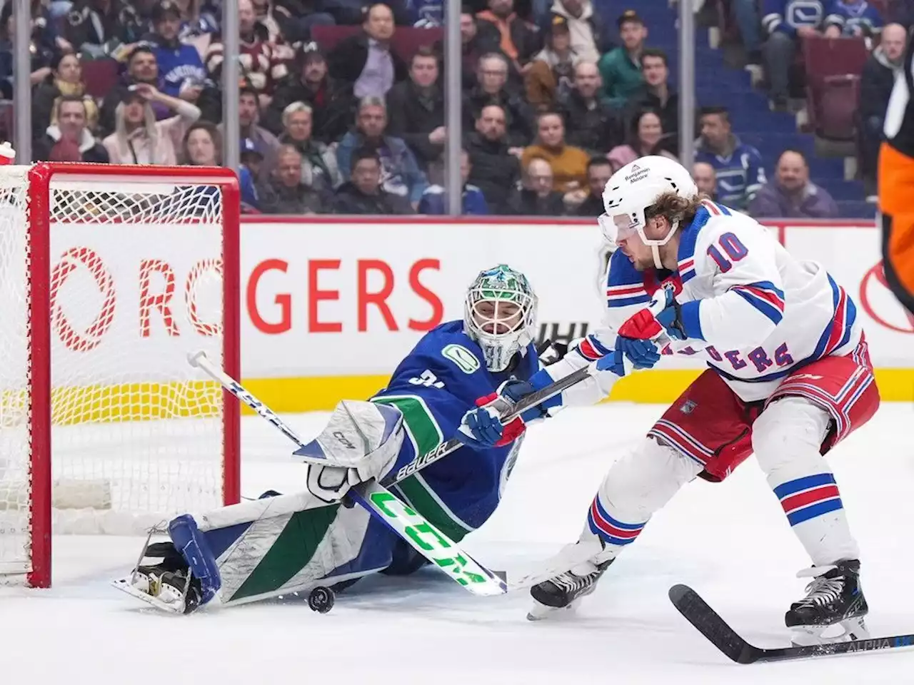 Rangers 6, Canucks 4: Arturs Silovs gets NHL baptism in curious crease call