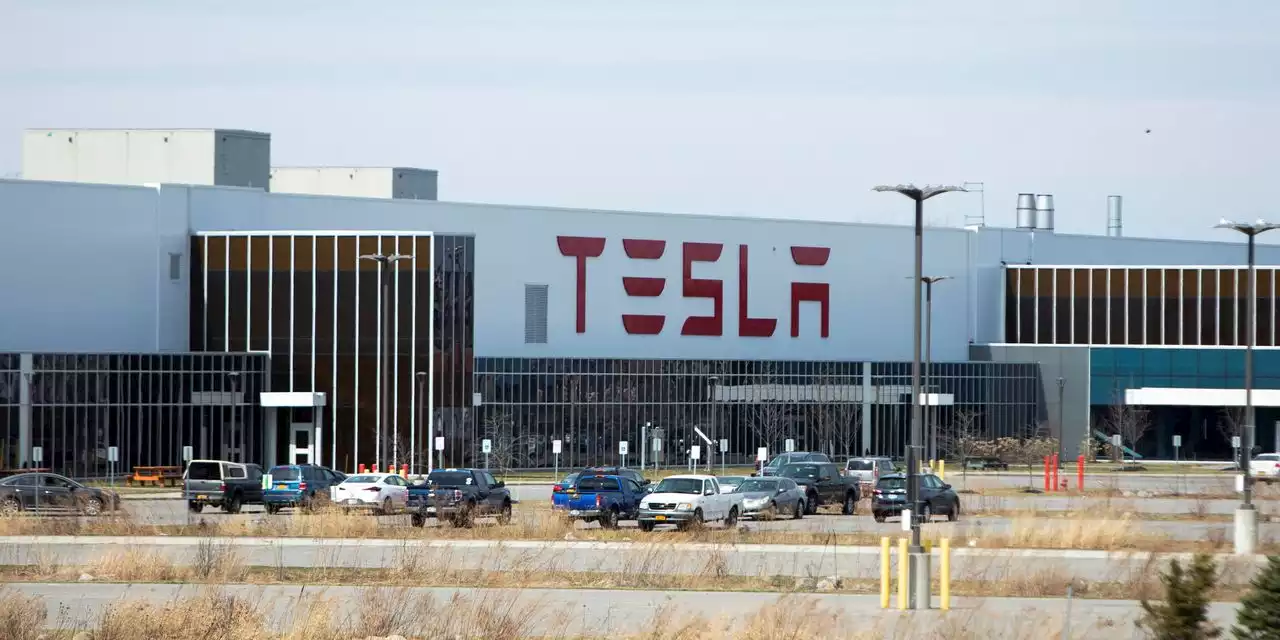 Tesla Workers Say Dozens Were Fired in Retaliation for Union Drive