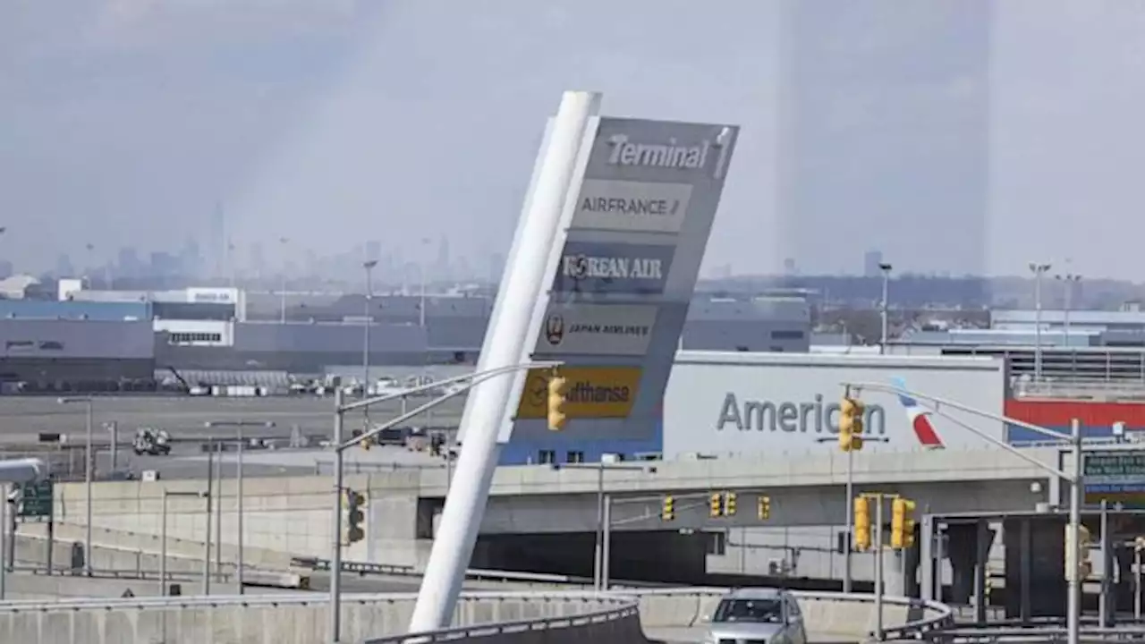 Passengers in air for 16 hours return to where they began after JFK electrical fire