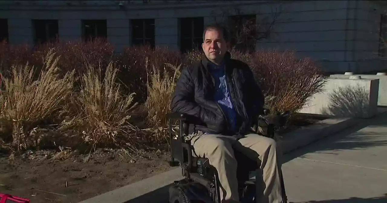 Denver city councilman who uses wheelchair had to hoist himself onto debate stage