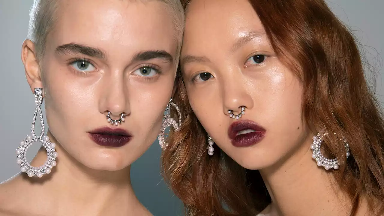 The prettiest AW23 beauty trends from goth glam to glazed lips