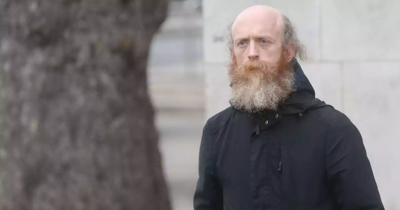 Man denies driving at anti-immigration protesters who ended up on bonnet of car