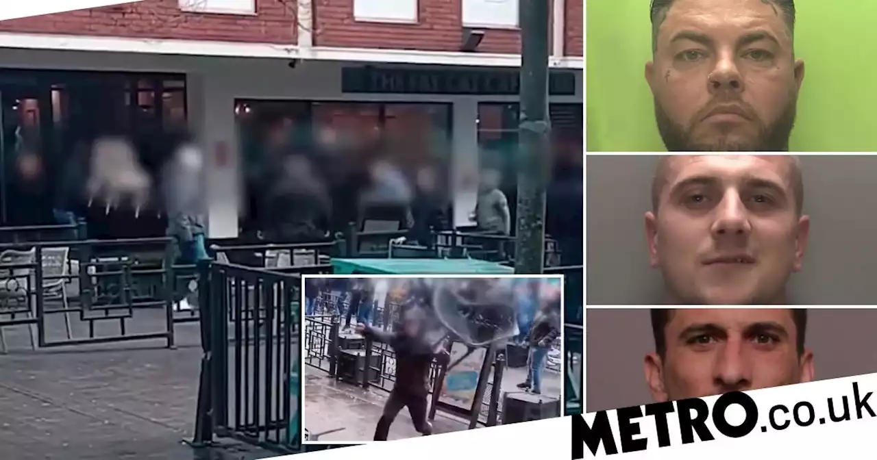 Football fans jailed after smashing up restaurant with families inside