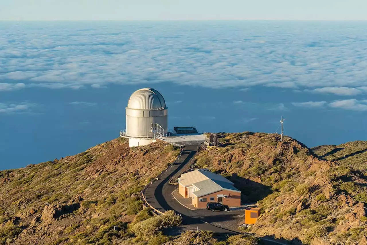 A weird comet is travelling through space with a dust blob it made