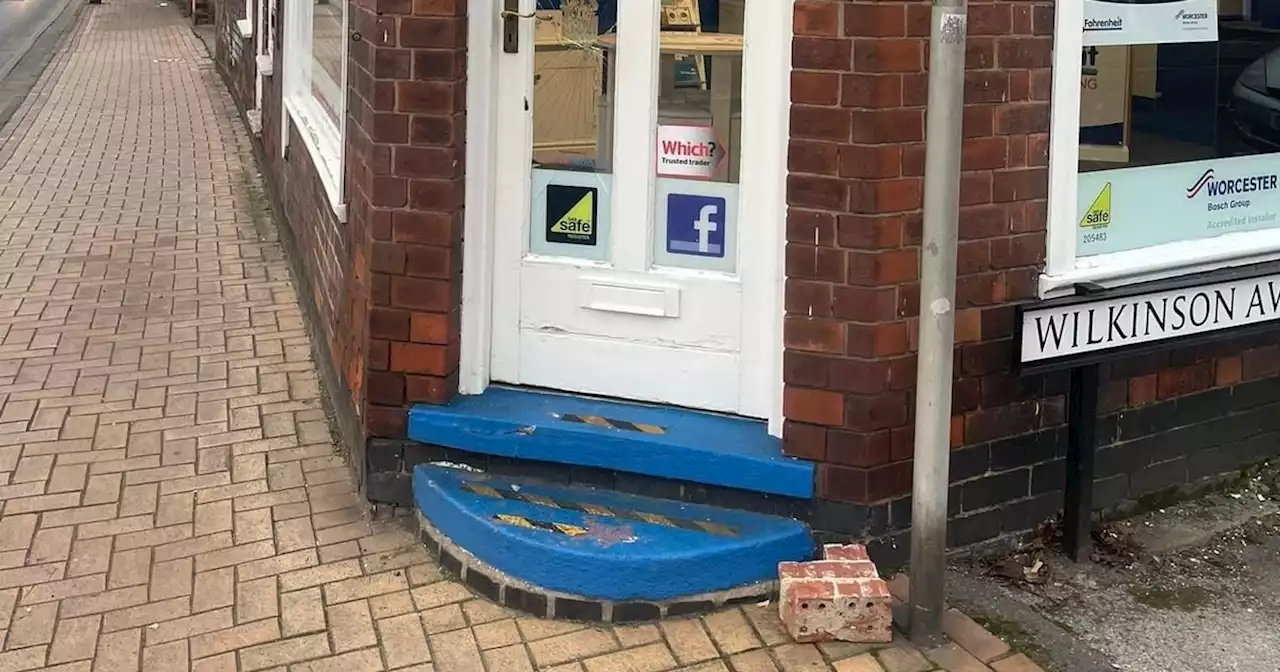 Shop owner's fury as window smashed with bricks