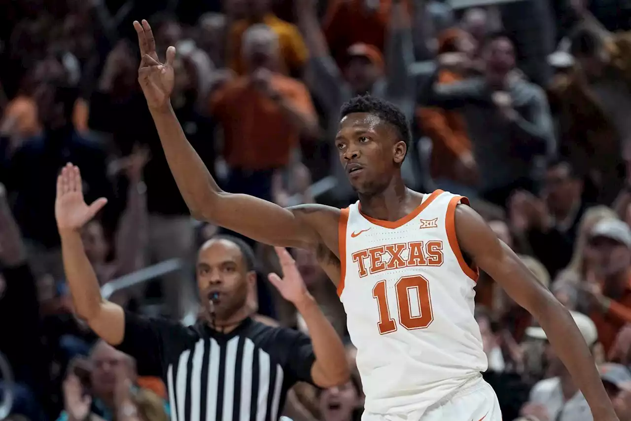 Texas rallies, then outlasts Oklahoma in OT to stay atop Big 12