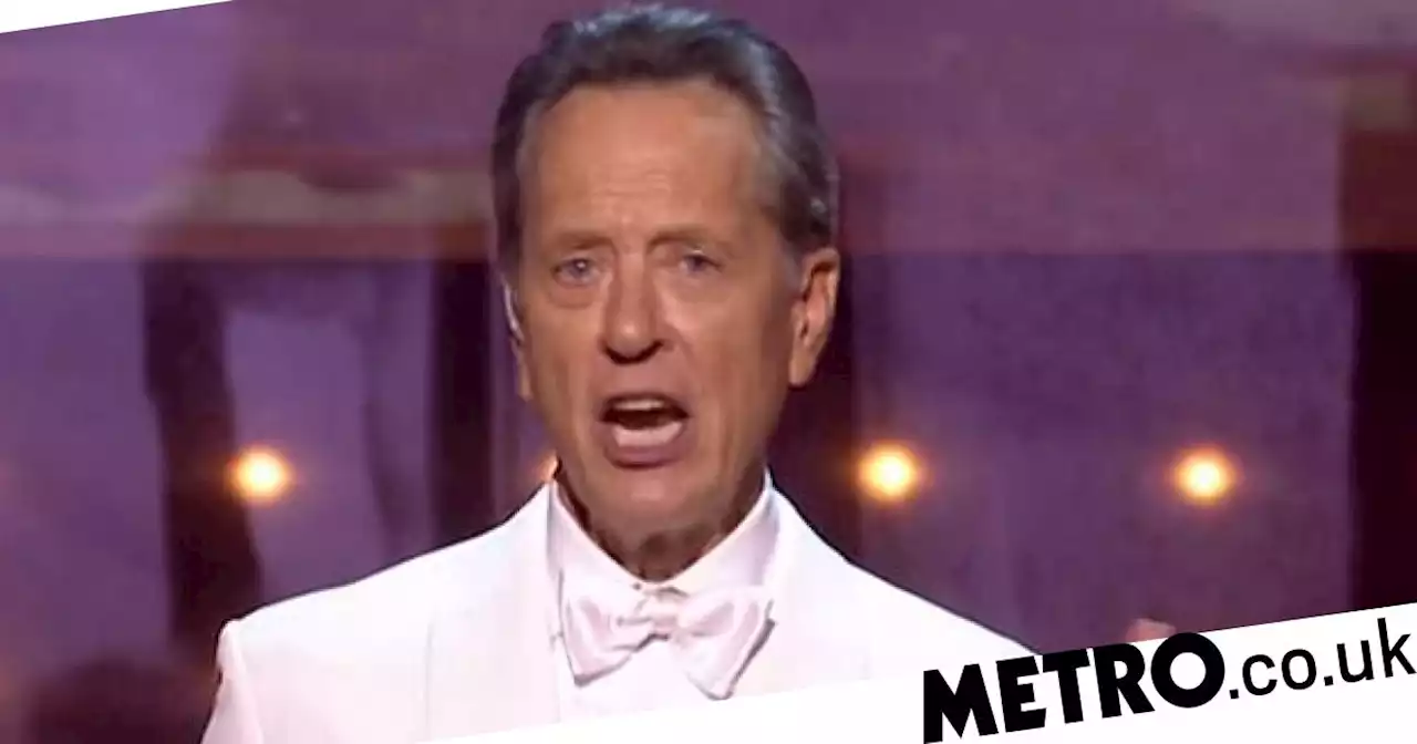 Richard E Grant apologises as he becomes choked up and tearful at Baftas