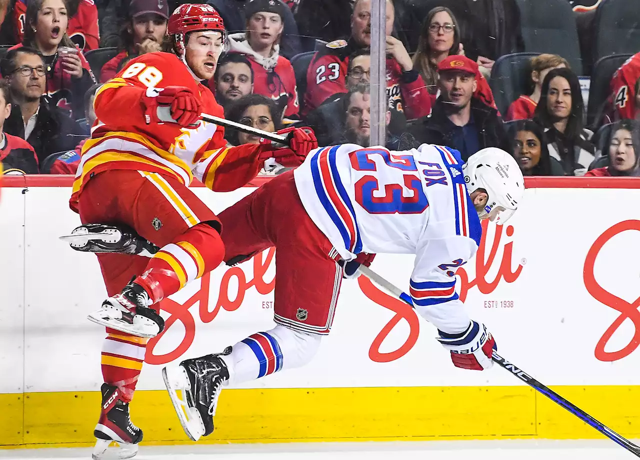 Rangers’ seven-game win streak ends with OT loss to Flames