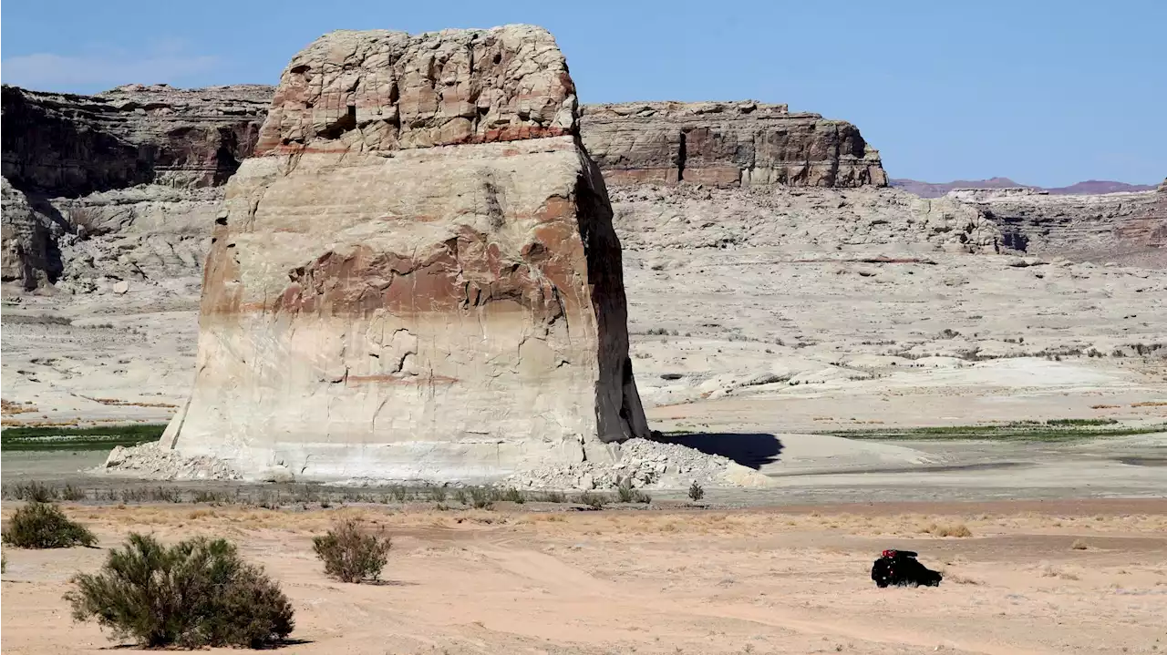 Lake Powell hits record low but snowy weather should bring reprieve