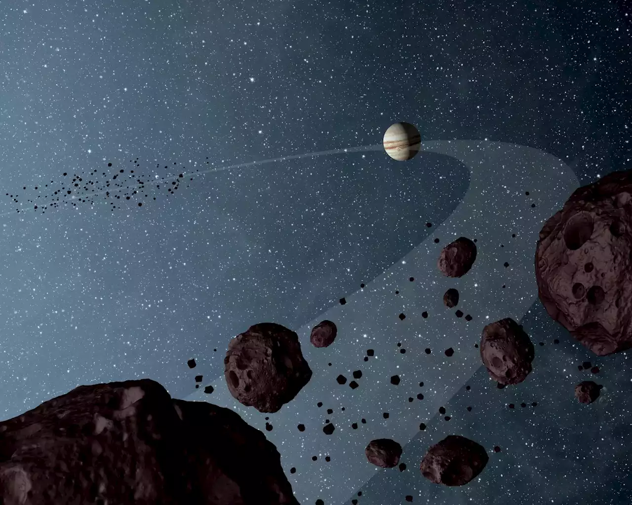 A New Explanation for the Mystery of Jupiter’s Asymmetrical Asteroid Swarms