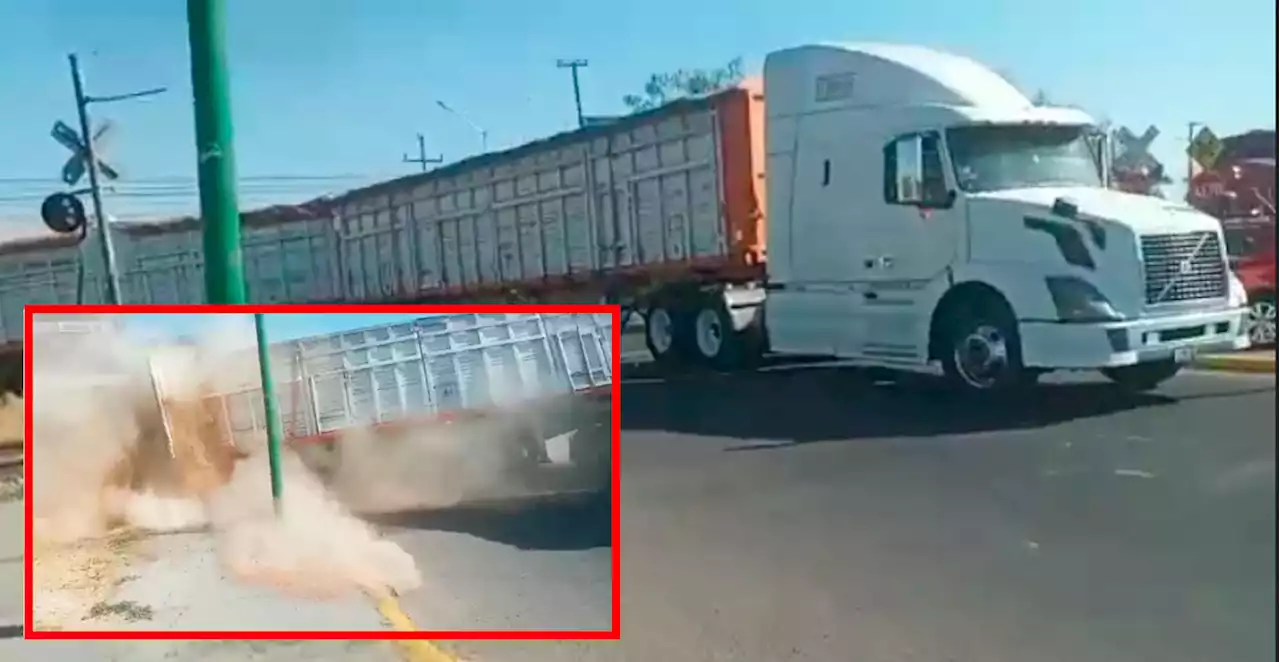 Captan en video accidente de tren en Celaya: conductor se atravezó con su trailer de remolques