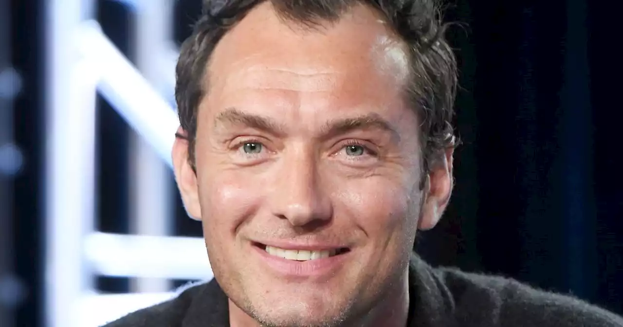 Jude Law 'becomes a dad for seventh time' as he and wife are seen with baby