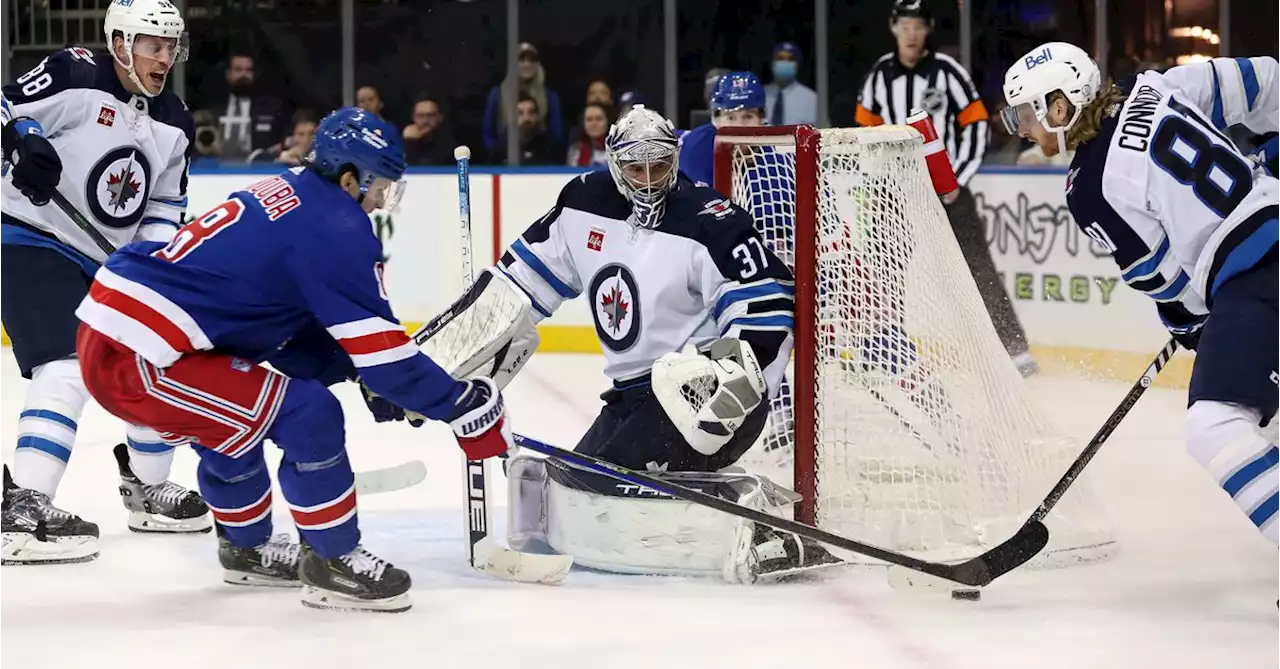 NHL roundup: Connor Hellebuyck (50 saves) guides Jets past Rangers