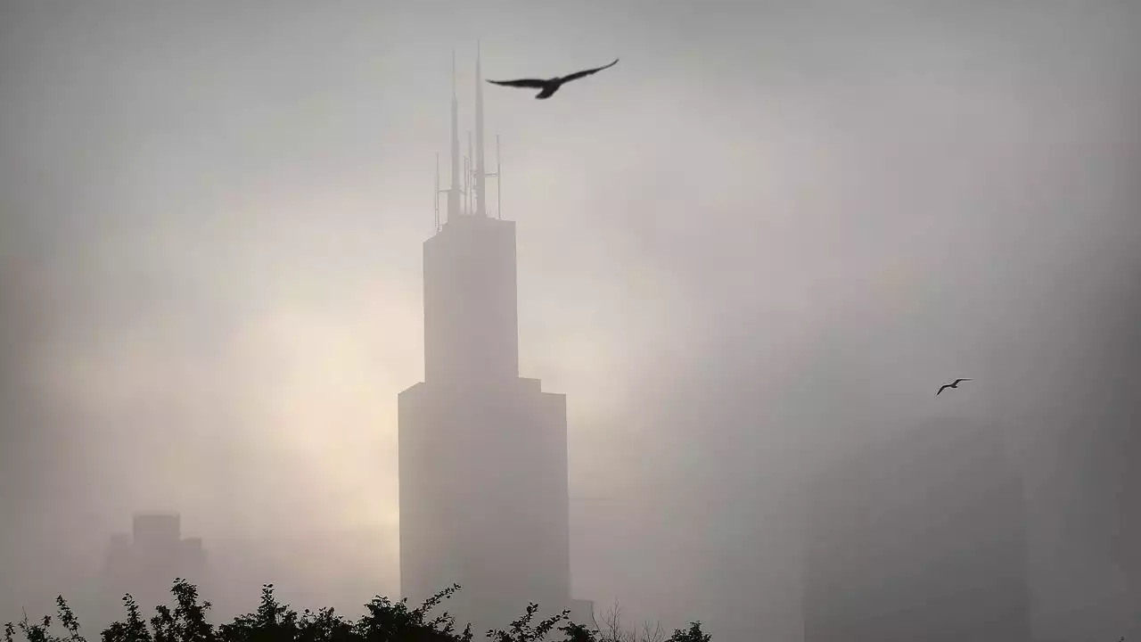 Chicago weather: Ice, rain and strong winds combine for winter storm