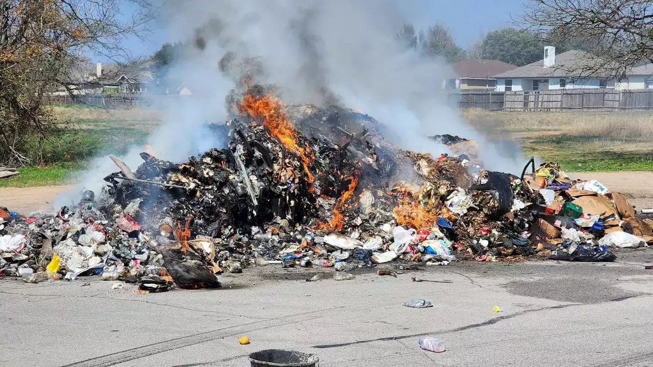 Road reopens after trash fire shut down traffic in East Travis County