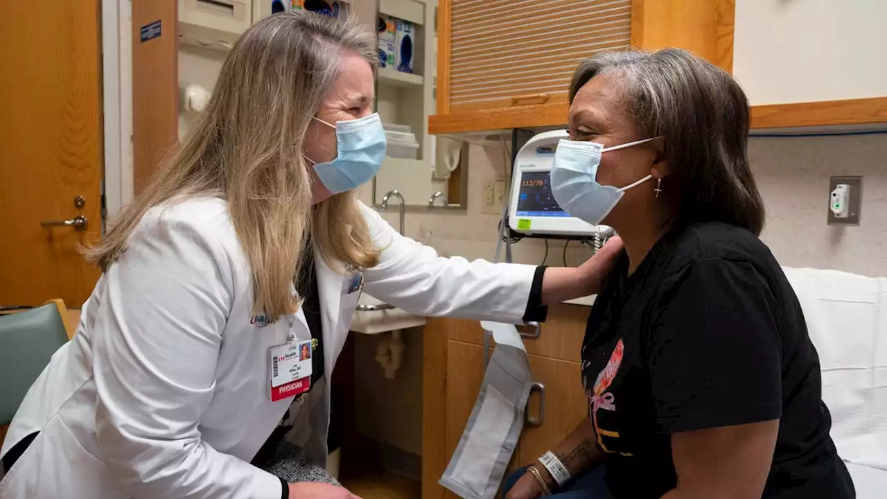 Like her mom, Wisconsin woman battled breast cancer. Now she's the first to complete vaccine trial.