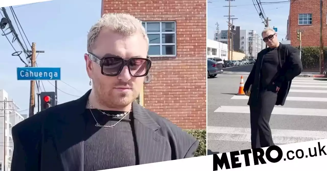 Sam Smith struts their stuff on crossing while joking about 'making friends'