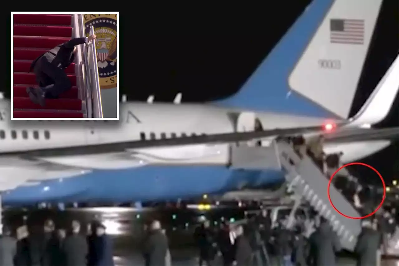 Just plane slippery! White House staffer tumbles off Air Force One