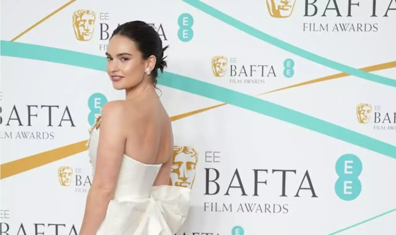 Lily James Shines in Scene-stealing Cutout Dress at BAFTAs 2023