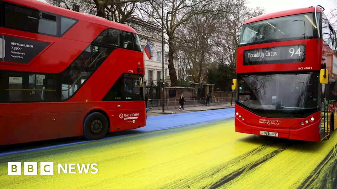 Led By Donkeys paint Russian Embassy road in Ukrainian flag colours