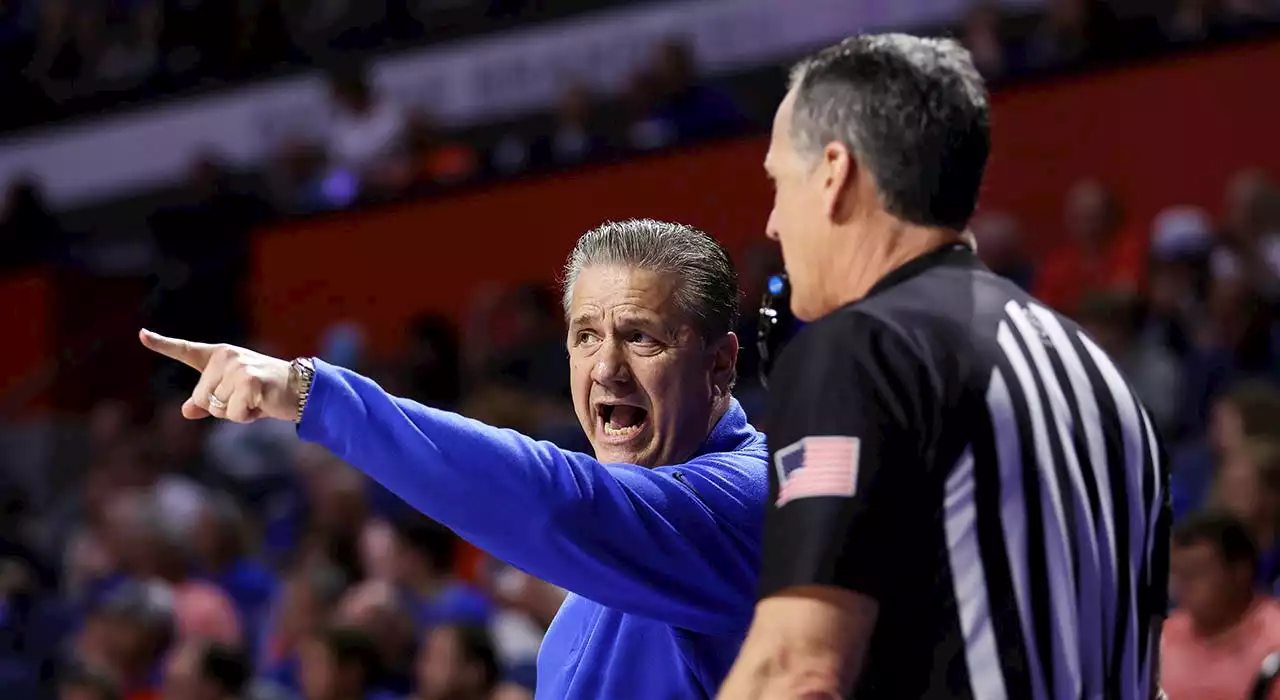 Florida fan ejected for wrapping arm around Kentucky player's neck during basketball game