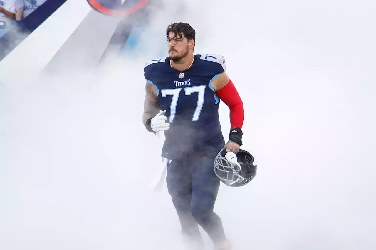 Titans forced to make Taylor Lewan, Robert Woods salary cap casualties