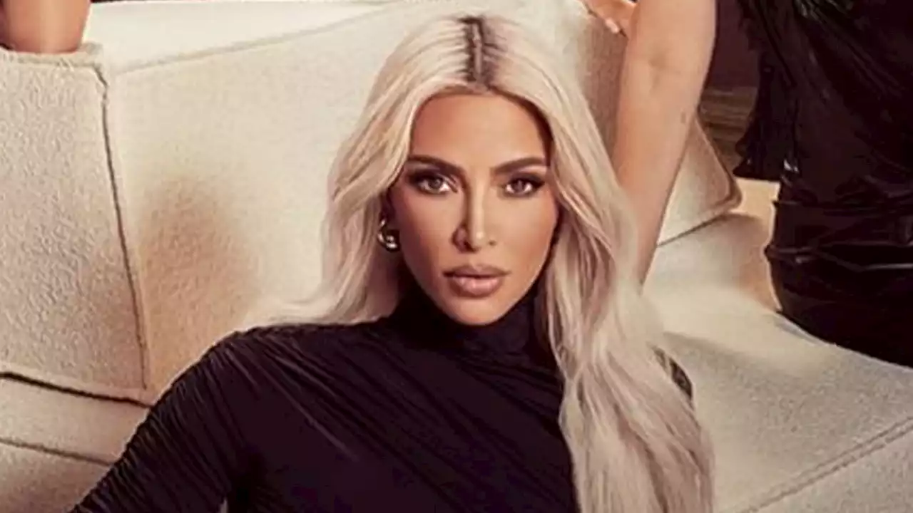 Kim Kardashian busts out of low-cut tank top while filming season 3 of Hulu show