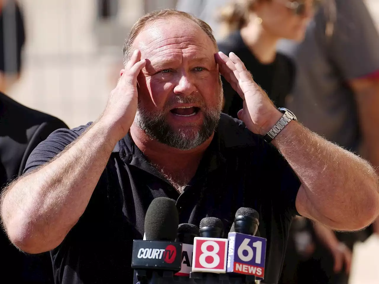 Alex Jones claims authorities want to take his expensive cat because he's bankrupt | Business Insider