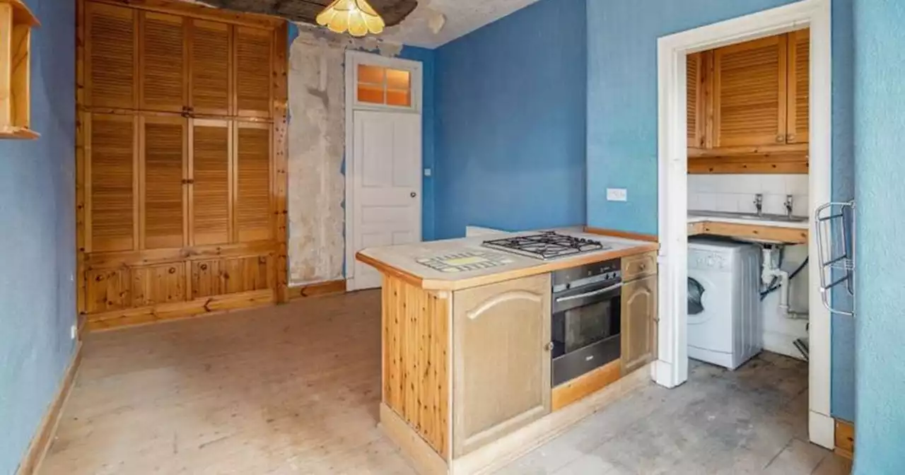 Glasgow one-bedroom flat with huge hole in ceiling goes on sale for £150k