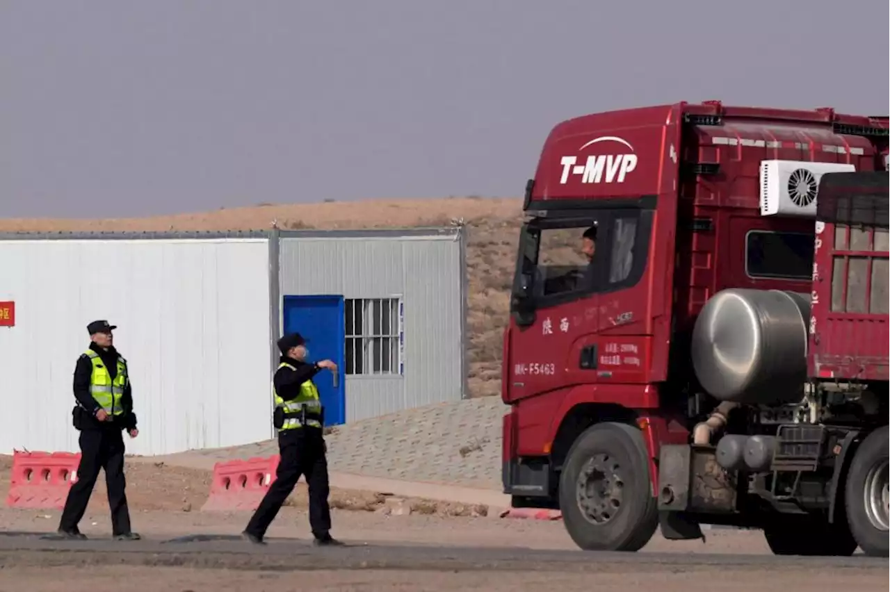 Workers dig by layers in search for 47 missing at China mine