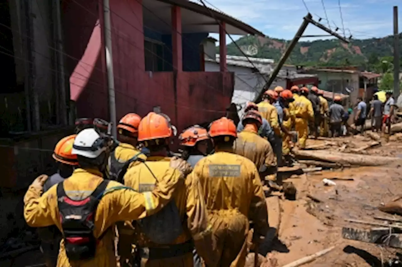 Brazil downpours leave at least 50 dead as rescue ship arrives