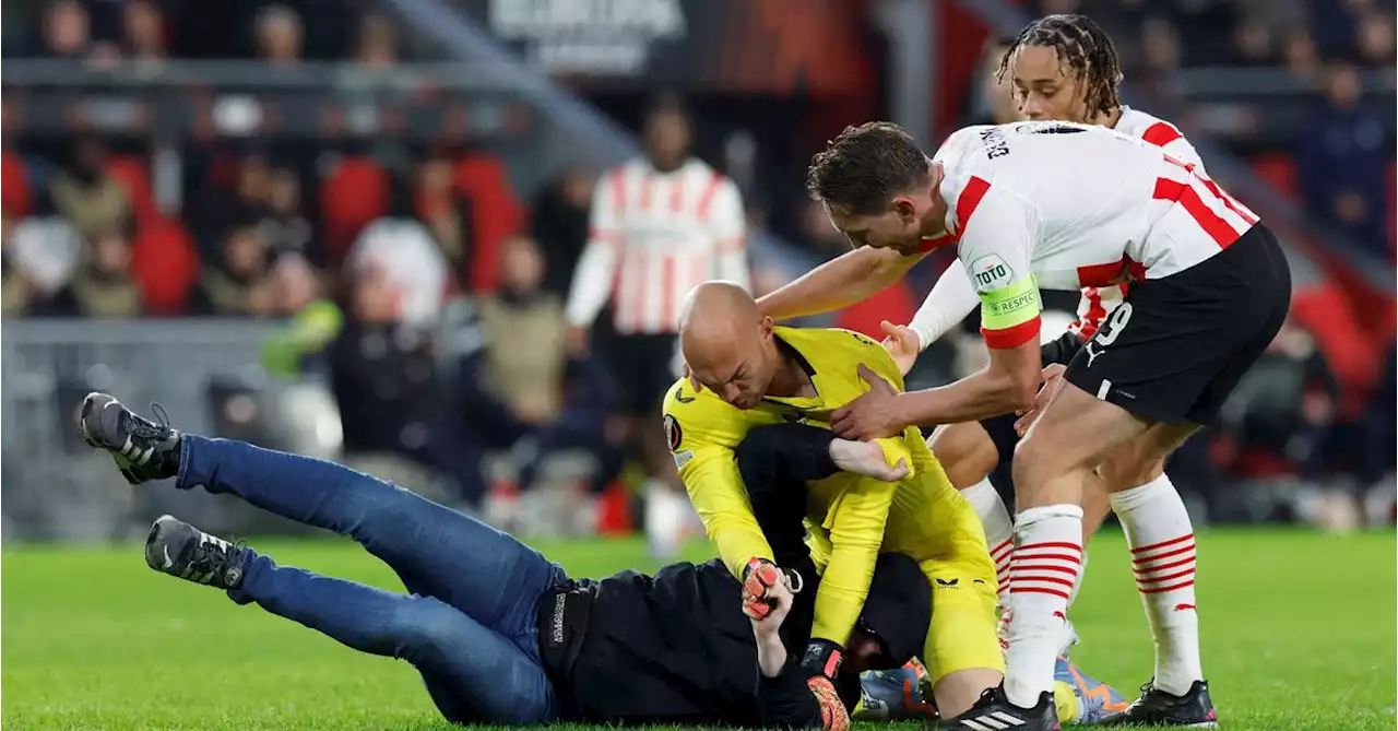 Sevilla advance despite PSV loss as goalkeeper is attacked by fan