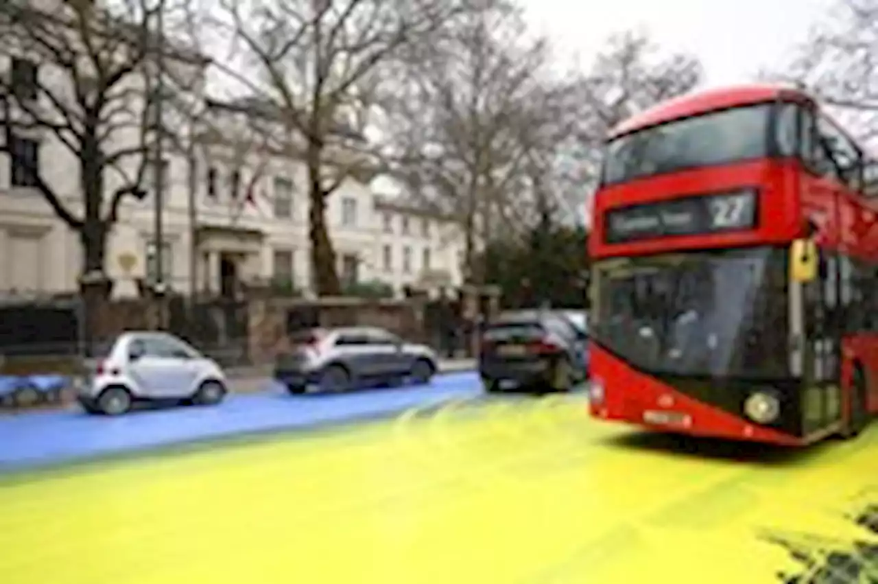 London activists paint Ukraine’s flag in front of Russian Embassy