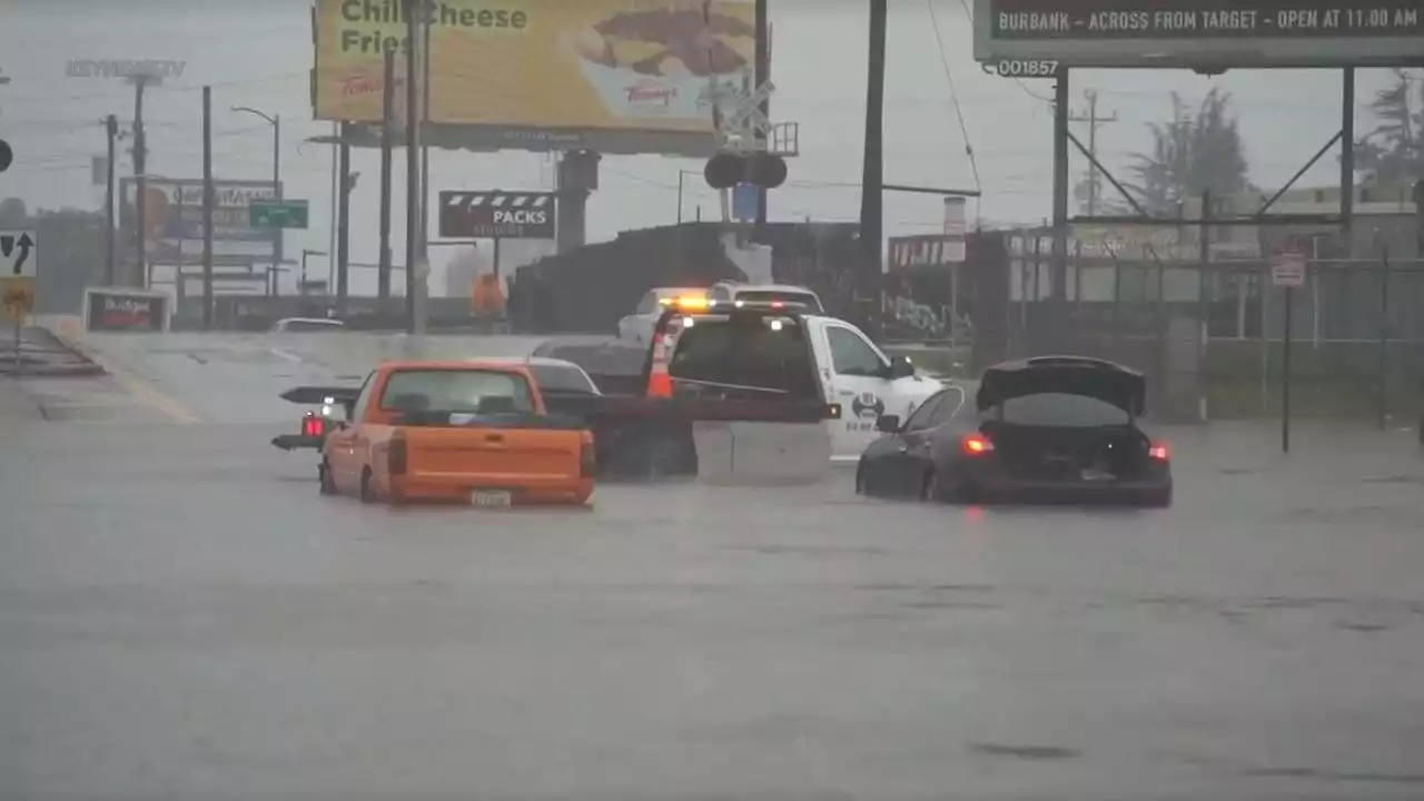 Multiple vehicles stuck in flood waters near Burbank Airport